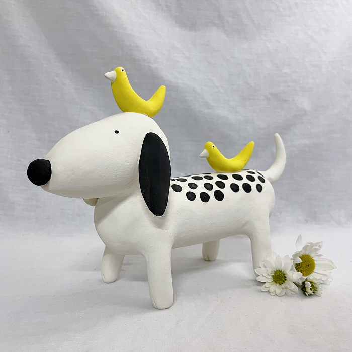 Ann Maree Gentile Long spotty dog with yellow birds hand-built ceramic svculpture Australian artist Town & Country Gallery Gippsland