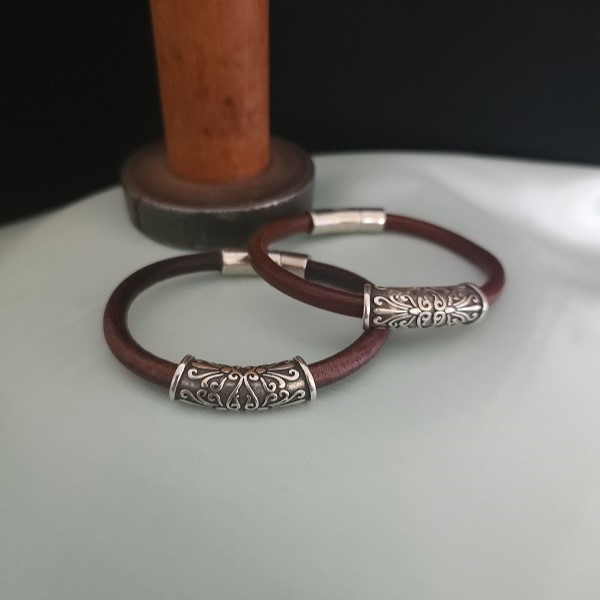 Lynn Walsh Braided European leather with embossed feature and magnetic clasp electroplated with sterling silver Australian artist Town & Country Gallery Gippsland