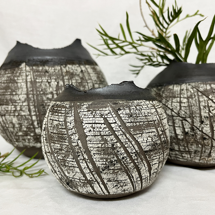 Minna Graham Hand made ceramic erosion vases Australian ceramic artist Town & Country Gallery Gippsland