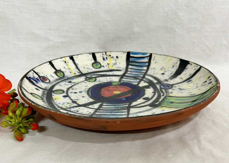 Susan Storm Round plate handcrafted in clay Australian ceramic artist Town & Country Gallery Yarragon